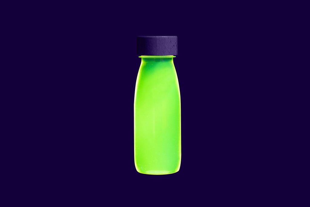 Botella sensorial - Float bottle FLÚO (varios colores) Petit Boum