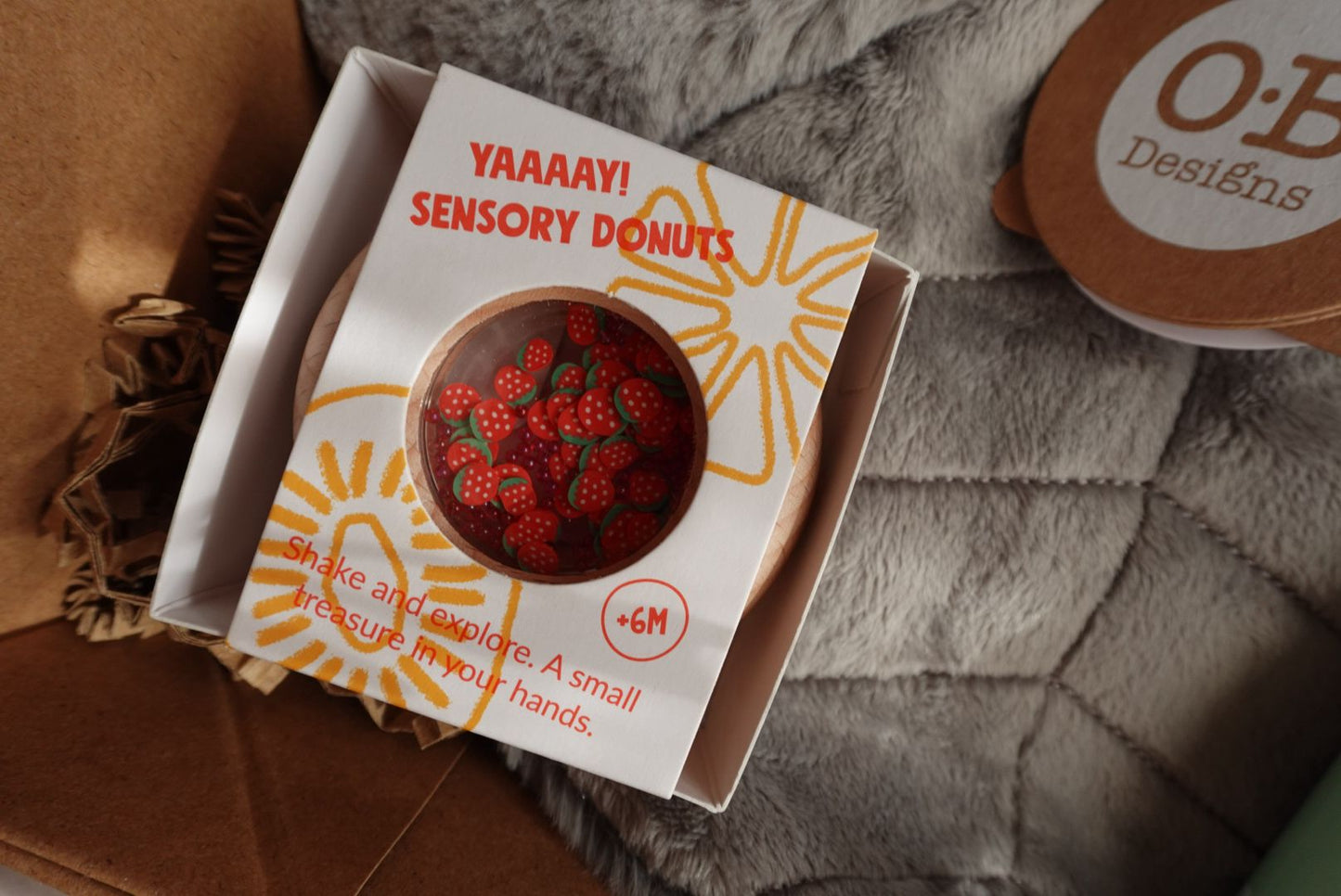 Caja Regalo Bebé Súper Oli (Premium: rutina + doudou + donut sensorial)